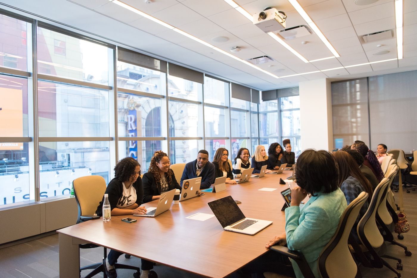 Team seated around a conference table in an office